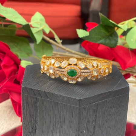 Moissanite openable bracelet with emerald stone